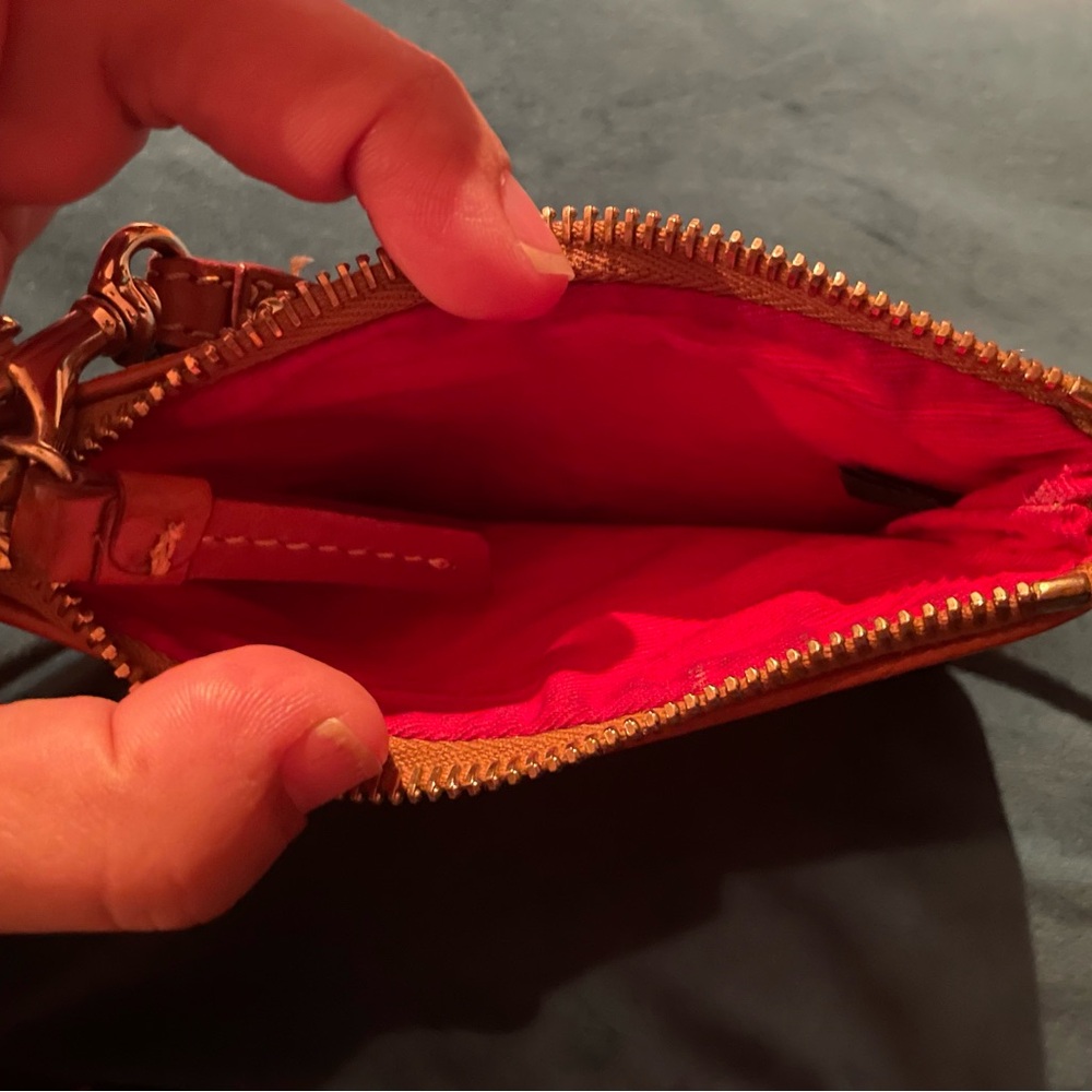Dooney & Bourke Black and Tan Textured Wristlet with Red Interior - Picture 3 of 3